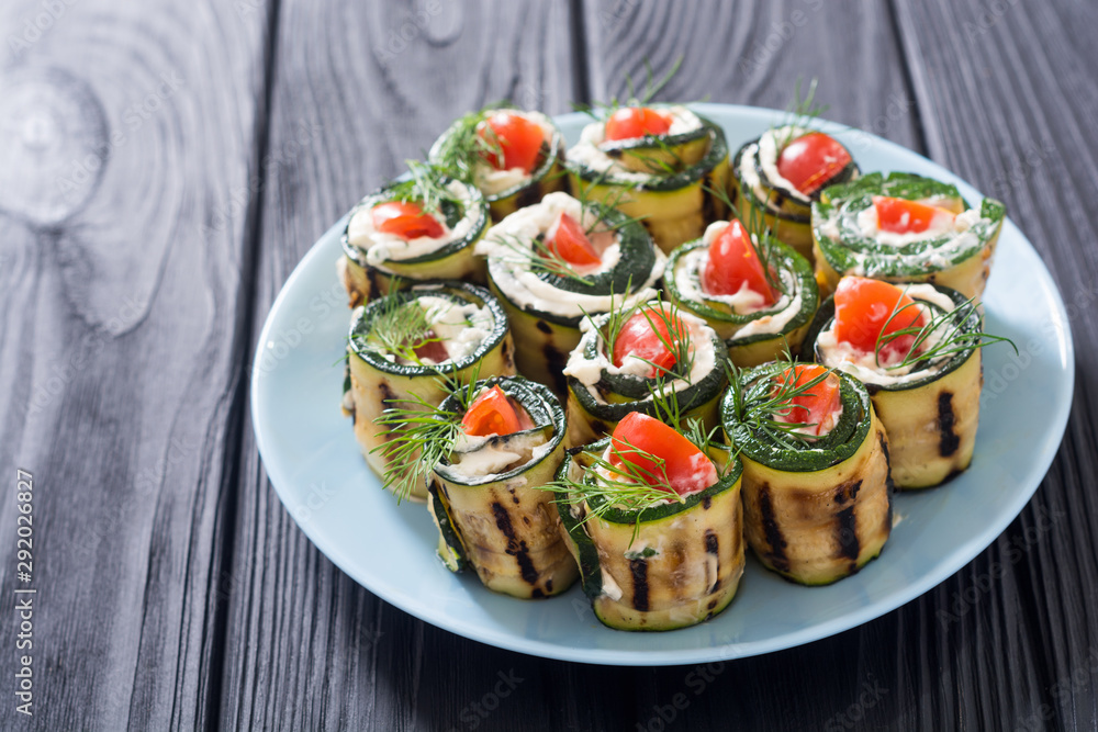 Zucchini rolls with cream cheese , tomatoes and dill Zucchini rolls with cream cheese , tomatoes and dill