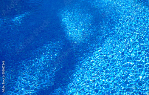 Fototapeta Naklejka Na Ścianę i Meble -  Ripples on the surface of an outdoor pool on a sunny day