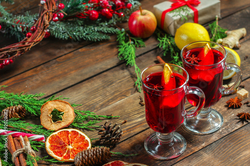 mulled wine with fruits, festive drink New Year and Christmas (grog, tasty wine-based drink) menu concept. food background. copy space. Top view