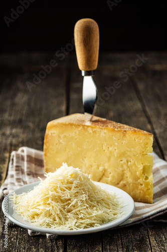 Tasty grated cheese. Parmesan cheese.