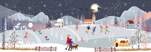 Panorama Winter night, Christmas and new year celebrating in village with happy kids sledding boy and girl playing ice skates in the winter park, teenagers skiing on the hill