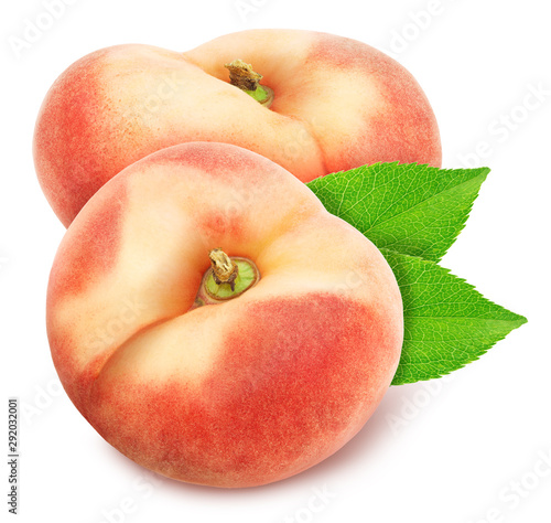 Group of ripe sweet donut peaches with leaves isolated on white background.
