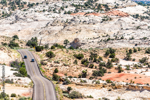 View of highway 12 scenic byway with cars on winding road in Grand Staircase Escalante National Monument in Utah photo