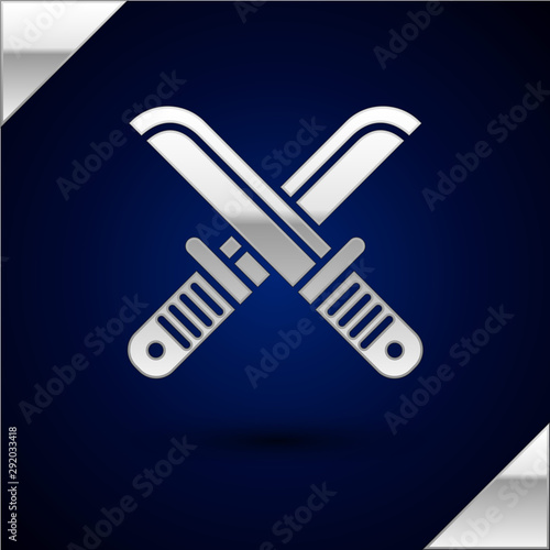 Silver Crossed hunter knife icon isolated on dark blue background. Army knife. Vector Illustration