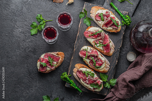 Bild auf Leinwand Delicious snacks, sandwiches, crostini, canape, antipasti for party or picnic time