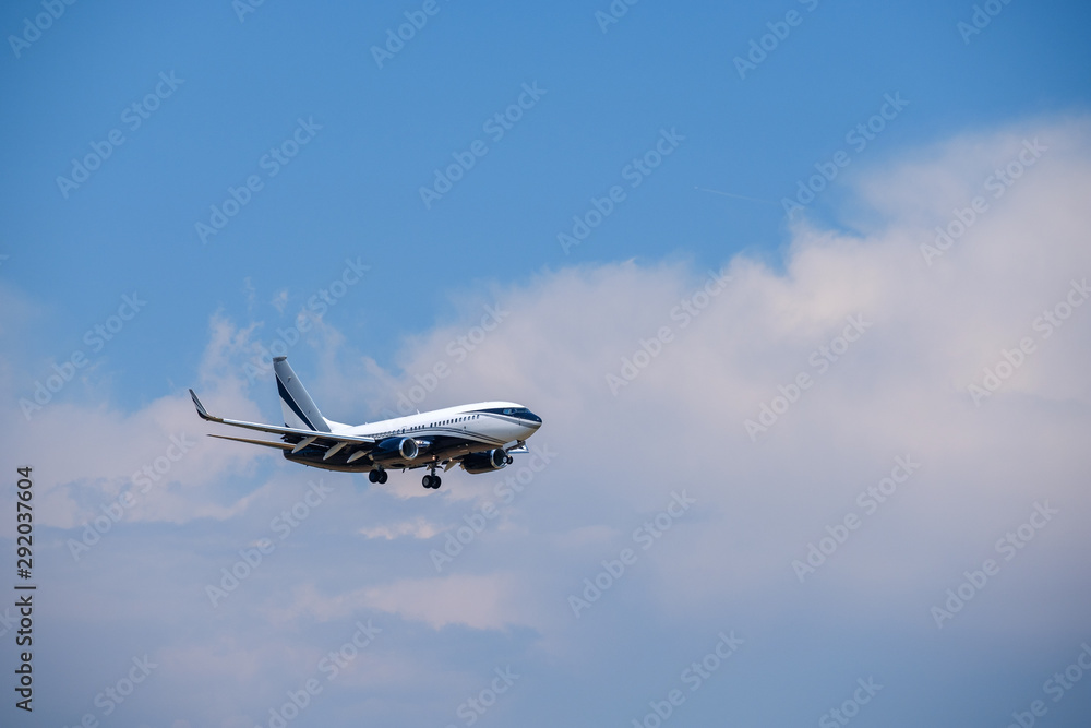 Fototapeta premium Passenger airplane in the blue sky
