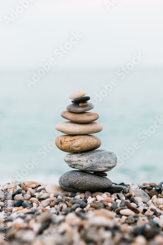 Balanced stone pyramid. Spa treatment scene  zen like concepts.
