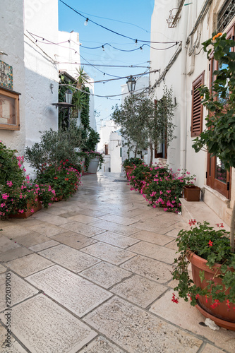 Fototapeta Naklejka Na Ścianę i Meble -  Ostuni, Italy - August 2019: Historic center of white city of Ostuni in Puglia, in a day of August