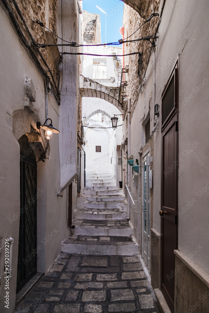 Ostuni, Italy - August 2019: Historic center of white city of Ostuni in Puglia, in a day of August
