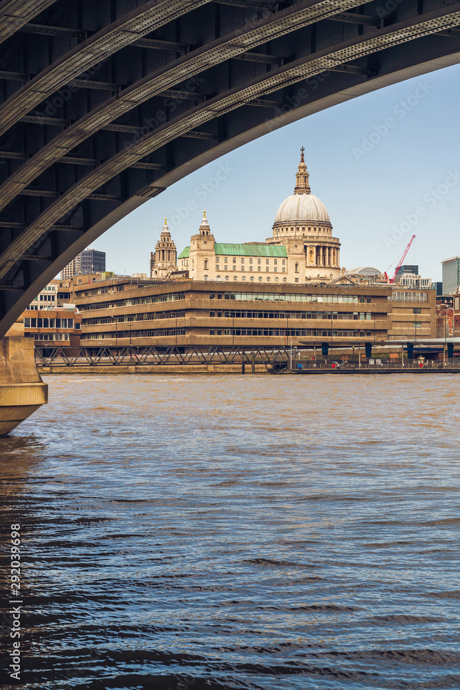 Fototapeta premium St. Paul's Cathedral in London. Photo taken from below Blackfriars Railway Bridge.