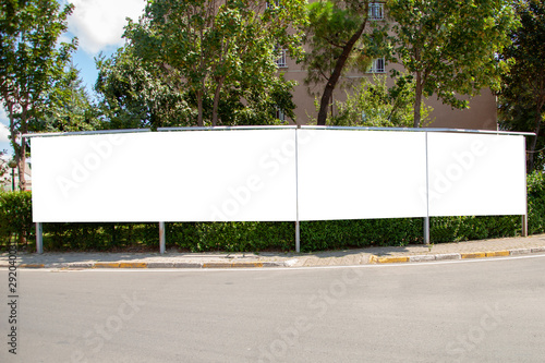 Wallpaper Mural advertising board on asphalt road Torontodigital.ca