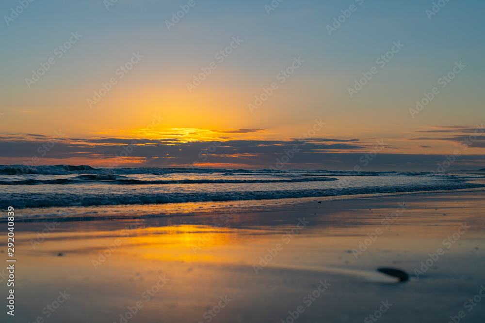 Oceanbeach as sun is on horizon