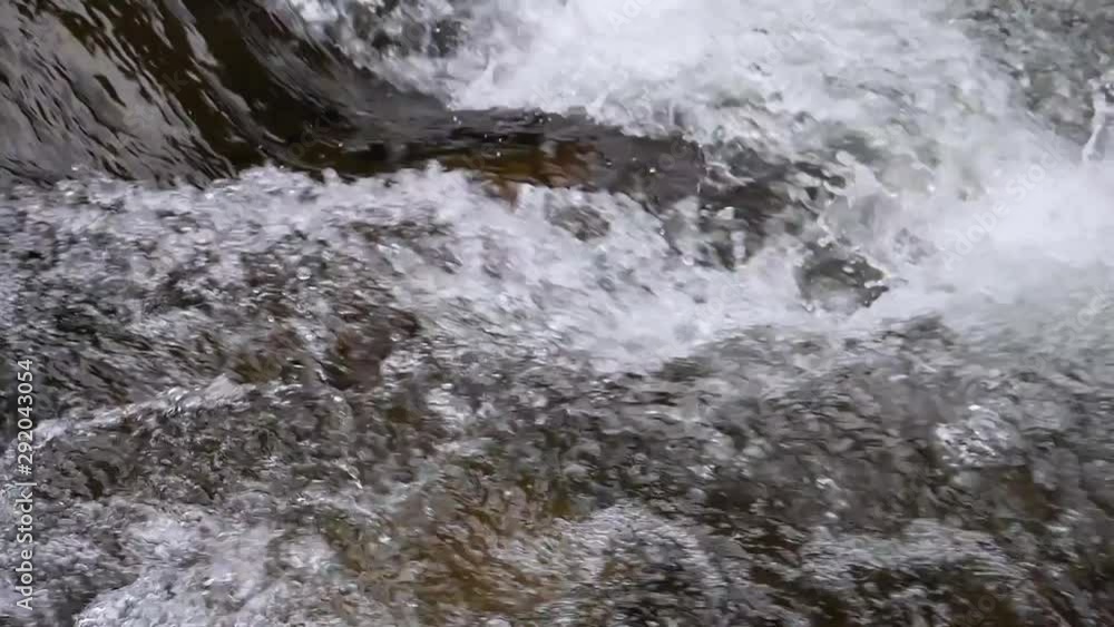 Boiling water of a mountain river in the mountains in summer, large Boiling water of a mountain river in the mountains in summer, large
