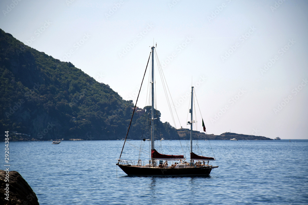 Quiet seascape view with a sailing boat Quiet seascape view with a sailing boat