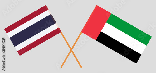 Thailand and the United Arab Emirates. Crossed Thai and UAE flags