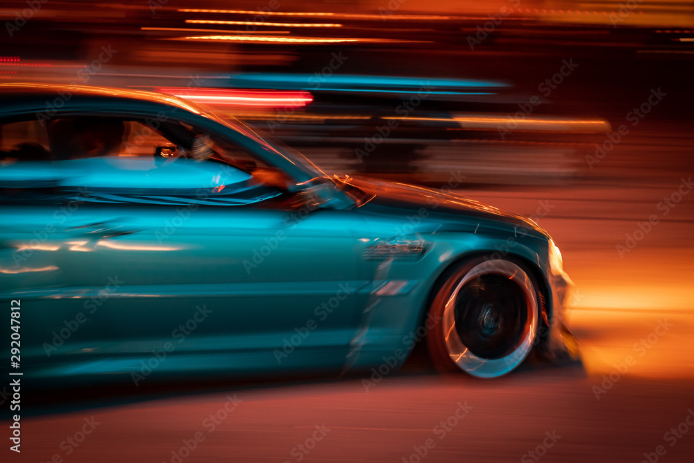 marina blue car racing at night