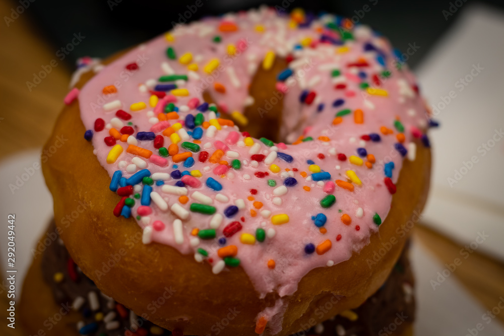 Close Up Iced Donuts on a Desk Close Up Iced Donuts on a Desk