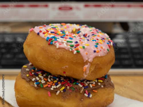 Close Up Iced Donuts on a Desk