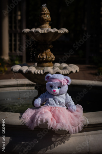 Teddy Bear Princess Sitting in a Public Park