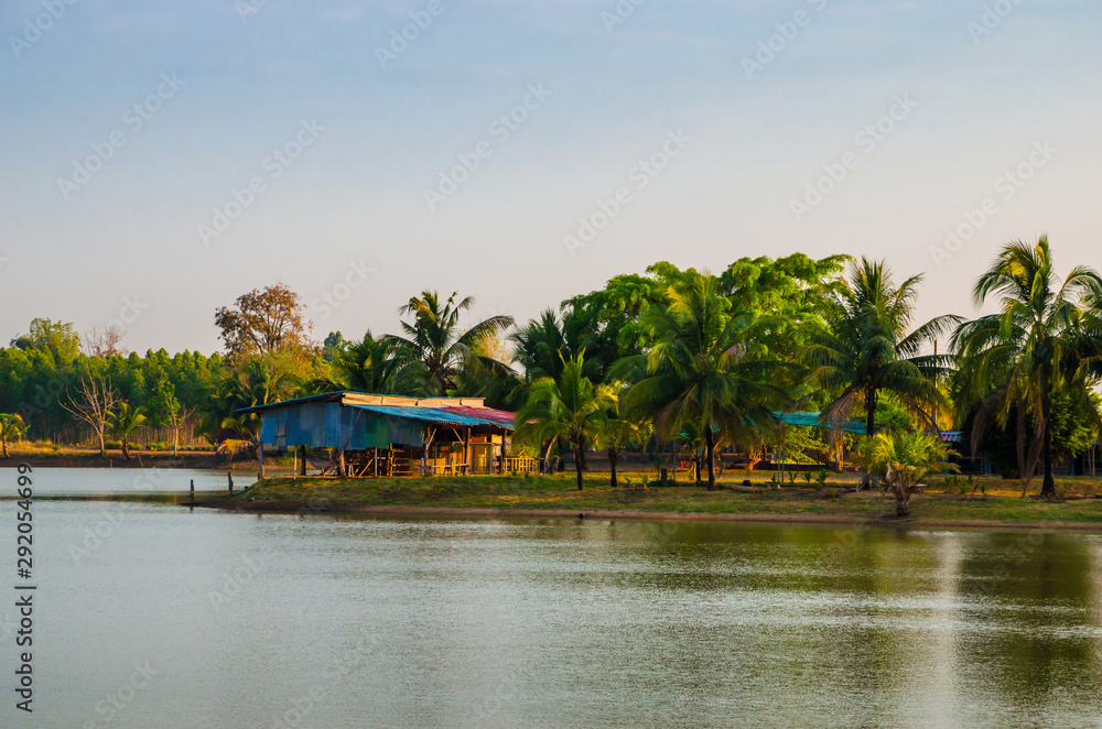 Beautiful small houses near lake in jungle, Thailand Beautiful small houses near lake in jungle, Thailand