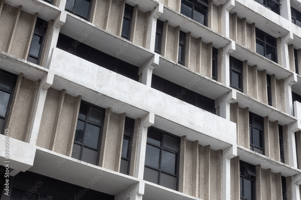 Diagonal view of concrete urban housing building, horizontal aspect Diagonal view of concrete urban housing building, horizontal aspect