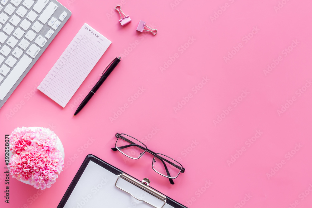 Female pink work desk flat lay space for text top view Female pink work desk flat lay space for text top view