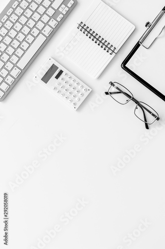 Minimalistic white office desk flat lay copy space top view
