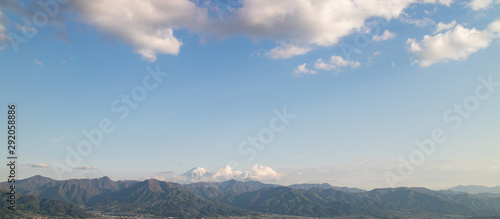 A panorama of mountains and the peak of MT. Fuji