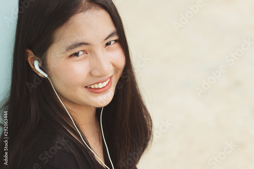 asia woman listening to music  in free time with fun and happy. photo