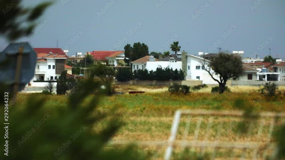 Summer sunny countryside view from car window, fast automobile movement. Worldwide traveling, green eco tourism concept. Summer sunny countryside view from car window, fast automobile movement. Worldwide traveling, green eco tourism concept.