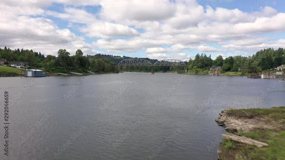 River dolly forward with bridge in background willamette river River dolly forward with bridge in background willamette river