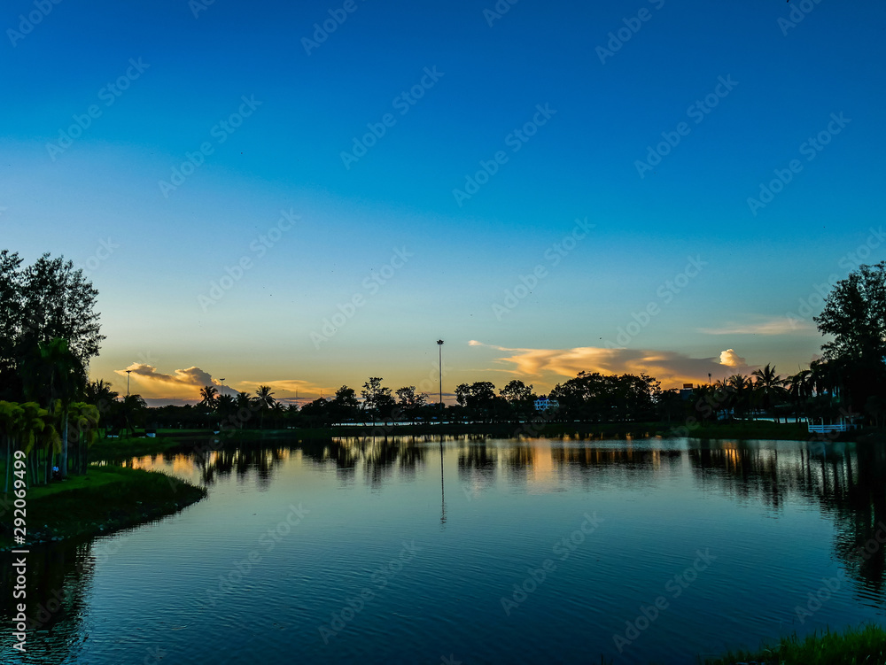 Scenic view of the lake with colorful lighting twilight time , Nong Prajak Park, Udon Thani, Thailand