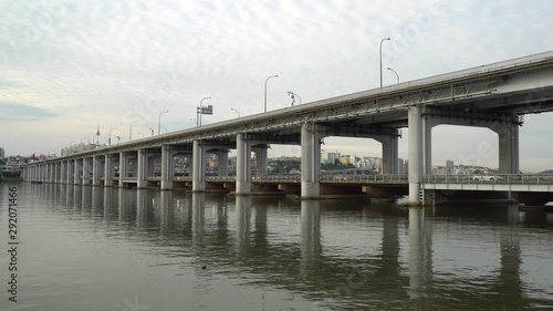 Part 5 The Banpo Bridge is a major double-decked bridge  in Seoul South Korea over the Han River. Here we see traffic moving on both levels photo