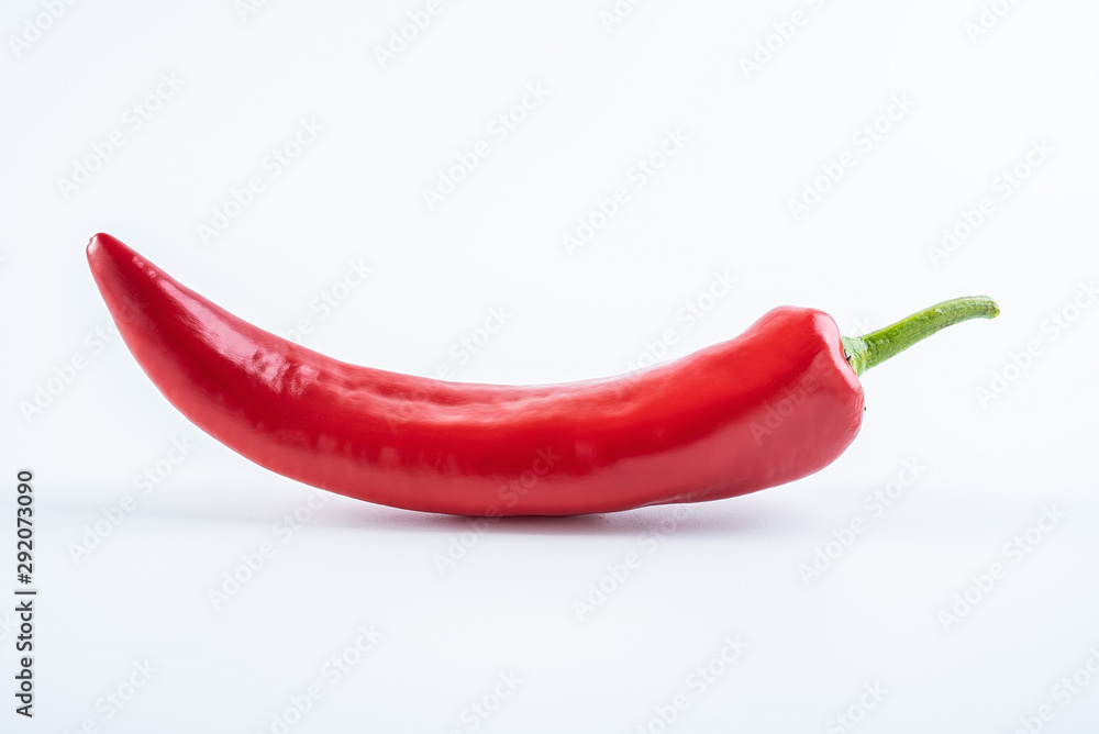a fresh red pepper on a white background a fresh red pepper on a white background
