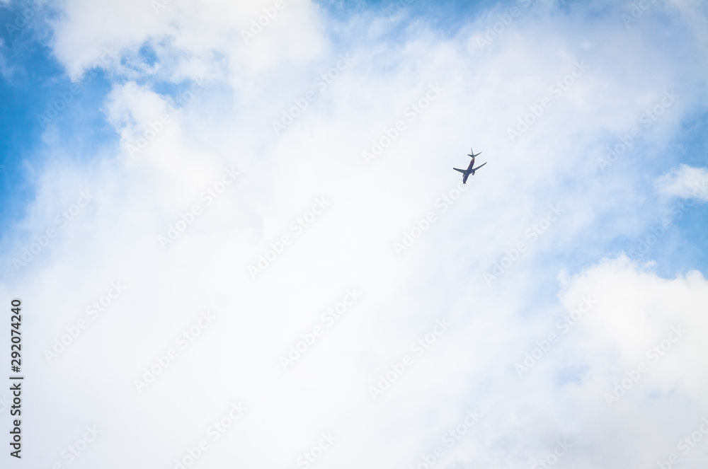 plane on sky. plane and blue sky with white clouds background.
