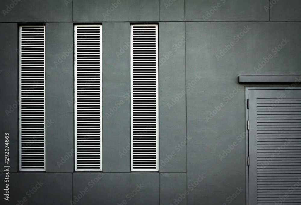 Fototapeta premium window with shutters metal door.