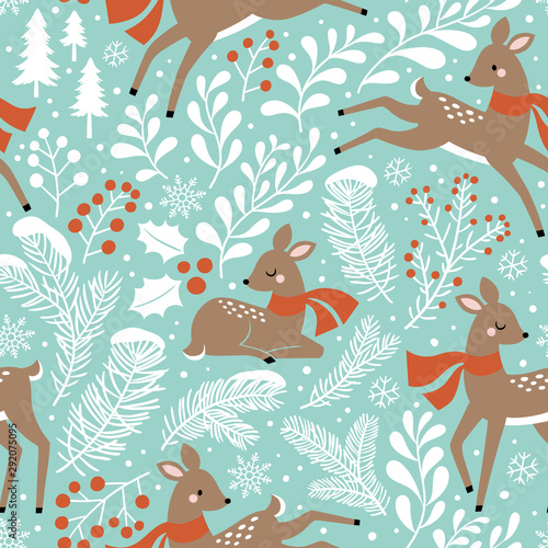 Seamless vector pattern with cute Christmas deer, pine trees, berries and snowflakes on light blue background. Perfect for textile, wallpaper or print design.