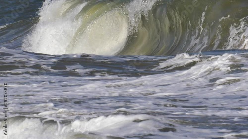 Heavy Waves on Baltic Sea Forming Beachbreak Barrels Slow Motion, Gdansk Poland photo