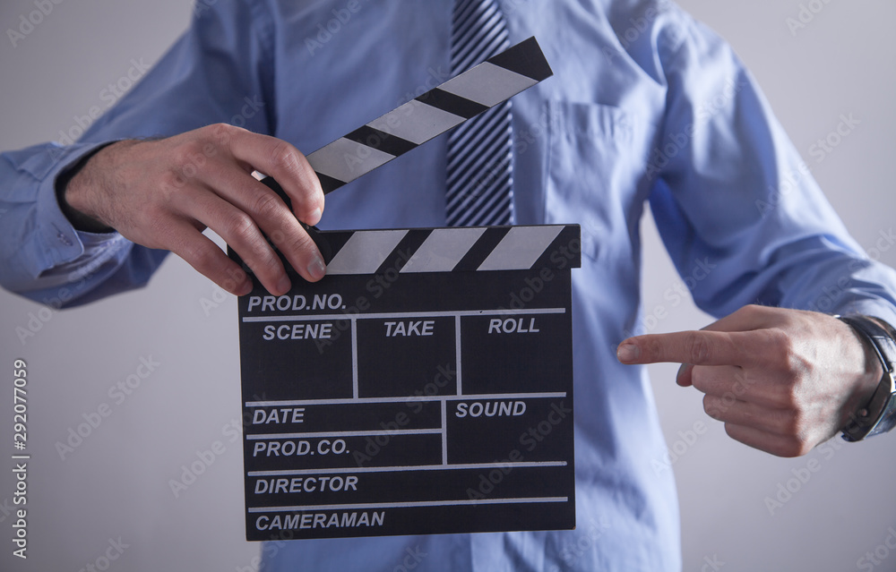 Man holding movie clapper. Making movie Man holding movie clapper. Making movie