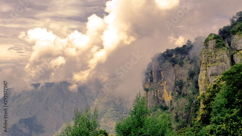 Fototapeta Naklejka Na Ścianę i Meble -  cloudy scenic landscape of palani hills from pillar rocks view point at kodaikanal hill station in tamilnadu in india