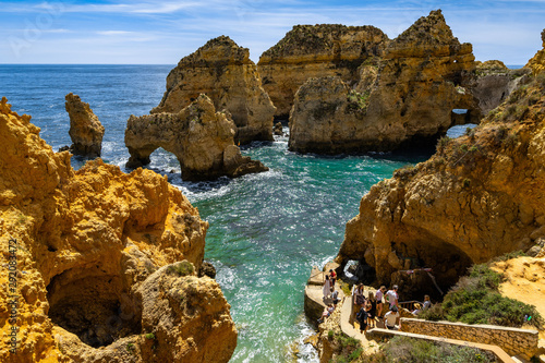 From the base of  Ponta da Piedade departing boat tours to explore the rocky coastline of Algarve. Lagos, Portugal, April 2019