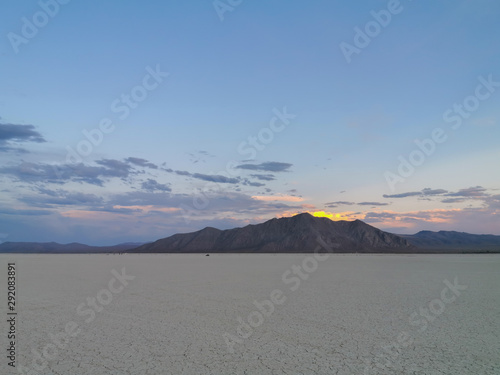 Sunrise and Sunset over the Cracked Earth Dry Arid Nevada Desert at Burning Man