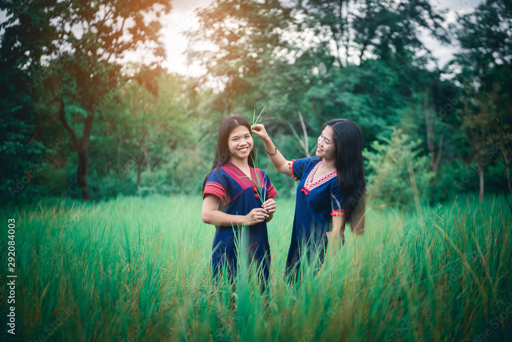 Portrait of young girls enjoy playing in the mist of foresst outdoor at countryside of Thailand Portrait of young girls enjoy playing in the mist of foresst outdoor at countryside of Thailand