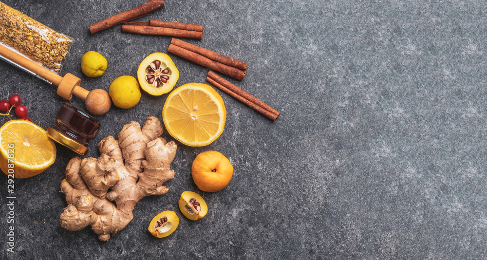 Banner of healthy ingredients lemon, cinnamon, ginger, cydonia, honey, berries chamomile flowers, propolis to prevent cold, Health and diet concept