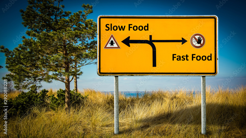 Street Sign Slow versus Fast Food