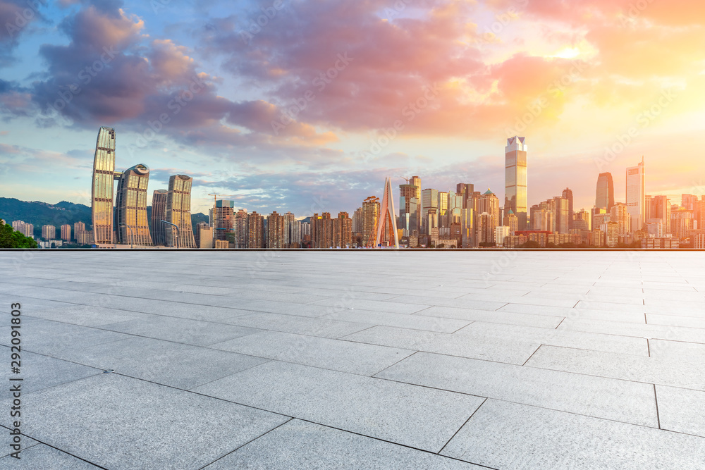 Empty square floor and cityscape with buildings in Chongqing at sunset,China.