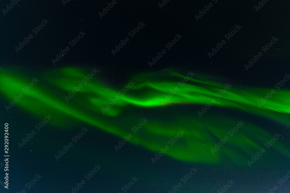 Northern lights, aurora in the sky at night.Horizontal .