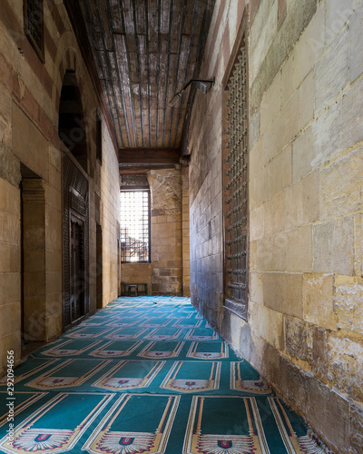 Stone bricks passage leading to Mamluk era mosque of Sultan Barsbay, Moez Street, Old Cairo, Egypt photo