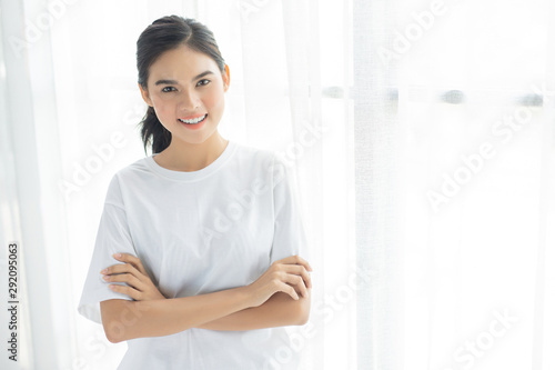 Portrait of beautiful young asian woman happiness standing in white background. Free Download Portrait of beautiful young asian woman happiness standing in white background. - GFXLoad