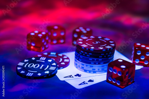 Casino abstract photo. Poker game on red background.  Theme of gambling. photo